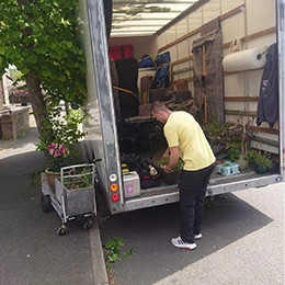 man and van driver is performing a rubbish removal job